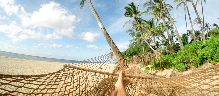 TÜV Rheinland: Warum Auszeiten wichtig sind – Tipps für einen erholsamen Urlaub